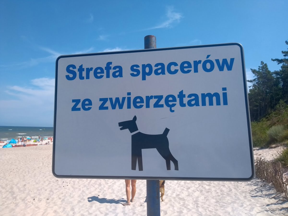 Tablica - strefa spacerów ze zwierzętami